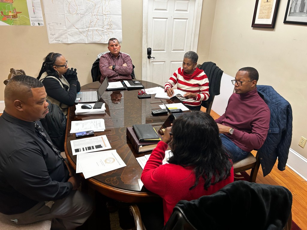 Walthourville's new mayor, Sarah B. Hayes (foreground) leads the new council's first work session at City Hall, Jan. 17, 2024. Clockwise from left: Councilmembers Patrick Underwood, Bridgette Kelly, Robert Dodd, Luciria Lovette, and Mitchell Boston.